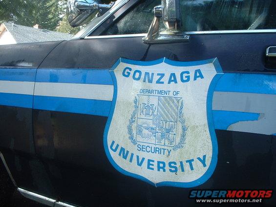 Dark blue car side with Gonzaga University Security shield