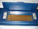 1979 Ford Bronco - Interior vanity mirror with lights, open, showing reflective surface.