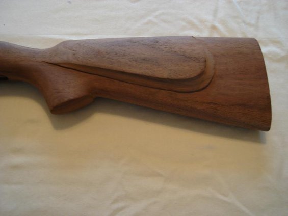 Wooden gun stock, close-up side view