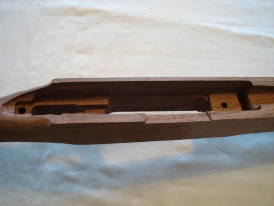 Wooden rifle stock inlet, close-up view