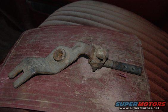 Transfer case shifter lever with "NISSAN" stamped on it