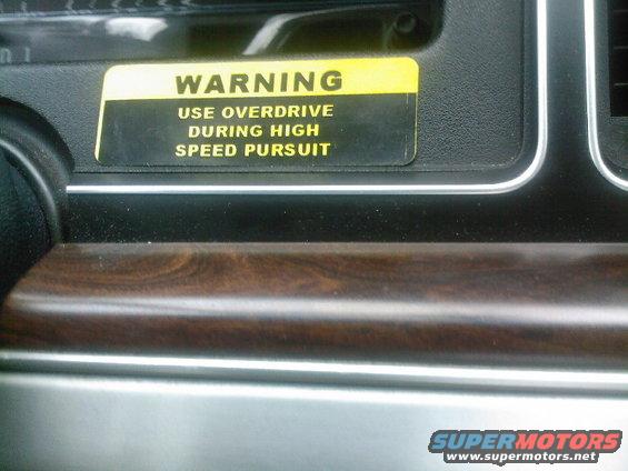 Dashboard warning sticker: Use overdrive during high speed pursuit