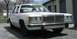1985 Ford Crown Victoria LTD - This sedan has a prominent chrome grille and a Virginia license plate.
