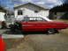 1964 Ford Galaxie - This 1964 Ford Galaxie is undergoing front-end work, with the engine and chassis components exposed.