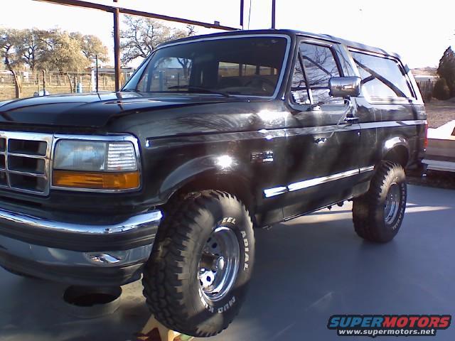 Black 1993 Ford Bronco, front quarter view, parked outside