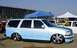 2000 Ford Expedition - A light blue 2000 Ford Expedition is parked outdoors with custom wheels and a lowered stance.