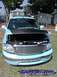 2000 Ford Expedition - A light blue 2000 Ford Expedition is shown from the front with its hood open, revealing the engine compartment.