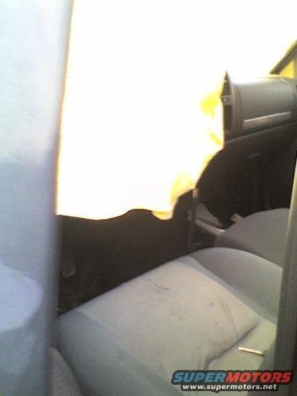 Interior view showing seats and dashboard of a vehicle