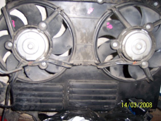 dual electric cooling fans with black housing and wiring