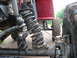 1979 Ford F-250 - Close-up view of off-road vehicle suspension and tires.
