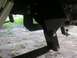 1979 Chevrolet C/K Pickup - Close-up view of the rear suspension and trailer hitch components on a vehicle.