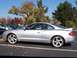 1996 Ford Probe - Side view of a silver coupe parked in a lot with autumn leaves on the ground.