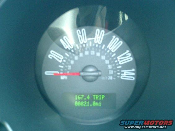 Speedometer of a 2007 Ford Mustang showing 0 mph and 8821.0 miles
