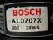 1999 Audi A4 - Close-up of a Bosch AL0707X part label, showing product codes and manufacturing numbers.
