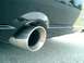 2006 Ford Mustang - Rear exhaust pipe detail on a car. Website watermark visible at the bottom right.