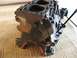 1999 Audi A4 - This is a close-up view of an engine block, showing the cylinder bores and a bolted-on bracket.