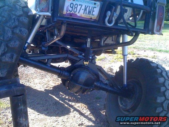 Rear axle and suspension with Arizona license plate 987-KWE
