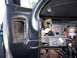 1996 Ford Probe - Interior view of a car's dashboard showing wiring and an open compartment.