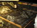 1978 Ford Bronco - Sound dampening material covers the interior of a truck bed, adorned with text and diagrams.