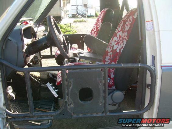 Interior with custom door bars and floral seat covers