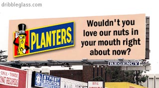 Billboard advertising Planters Nuts with slogan 'Wouldn't you love our nuts in your mouth right about now?'