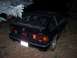 1987 Honda CRX - Rear view of a black 1987 Honda CRX Si parked outdoors at night.