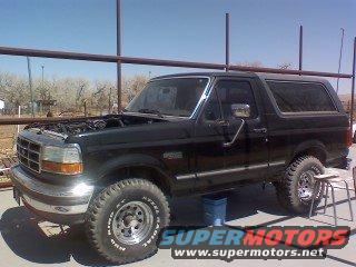 Black 1993 Ford Bronco, 3/4 front view, hood up