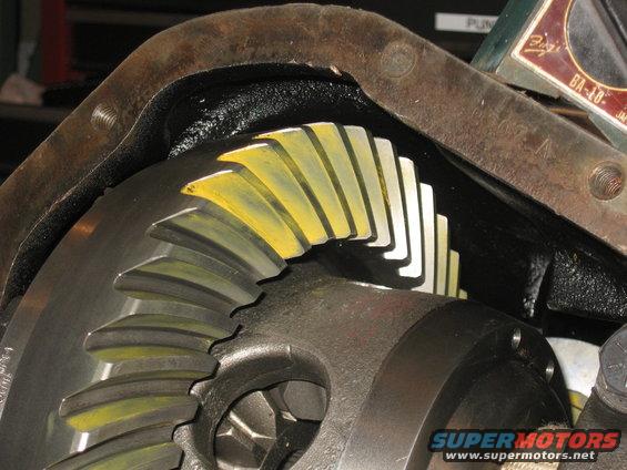 Close-up of differential gears with yellow markings
