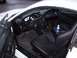 1997 Ford Mustang - The interior of a 1997 Ford Mustang features black leather seats and a clear view of the dashboard and steering wheel.