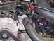 2004 Mercury Grand Marquis - Installing water outlet elbow and bolts.