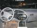 1998 Ford Taurus - Interior view of a 1998 Ford Taurus, highlighting the dashboard and driver's area.