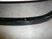 1996 Ford Probe - A damaged carbon fiber wheel rim shows a significant crack and signs of wear on its surface.