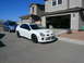 1996 Ford Probe - A white Dodge Neon SRT-4 is parked in a driveway with a blue minivan behind it.