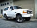 1994 Ford Bronco - This white 1994 Ford Bronco is shown in a 3q-front view, equipped with BFGoodrich Mud-Terrain T/A tires.