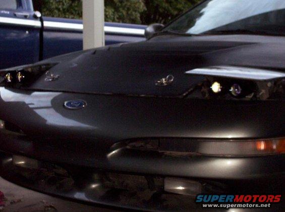 1995 Ford Probe front end with pop-up headlights visible