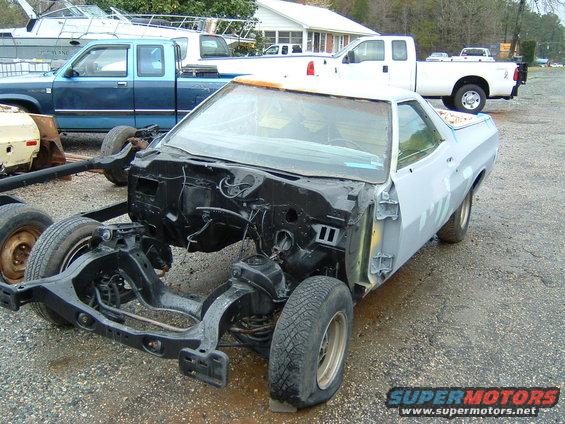 1979 Ford Ranchero body on chassis, primer gray, front view, missing engine and front clip