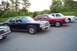 1991 Mercury Marquis - A dark blue 1991 Mercury Marquis sedan is parked in a line with other vehicles.