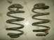 2004 Jeep Wrangler - A pair of used coil springs are shown resting on a tiled surface.