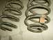 2004 Jeep Wrangler - Coil springs with a Mopar label are shown, but the vehicle year is not identifiable from this image.