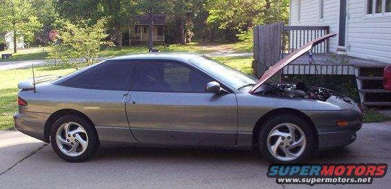Gray 1995 Ford Probe coupe, side view, hood open