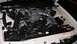 1994 Ford Thunderbird - Engine bay of a 1994 Ford Thunderbird, showing the V8 engine and associated components.