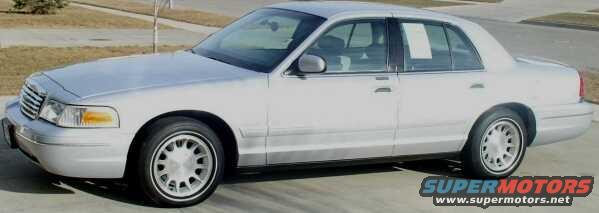 Silver 1998 Ford Crown Victoria sedan, side view