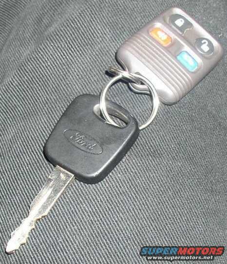 Ford key and remote fob on textured fabric
