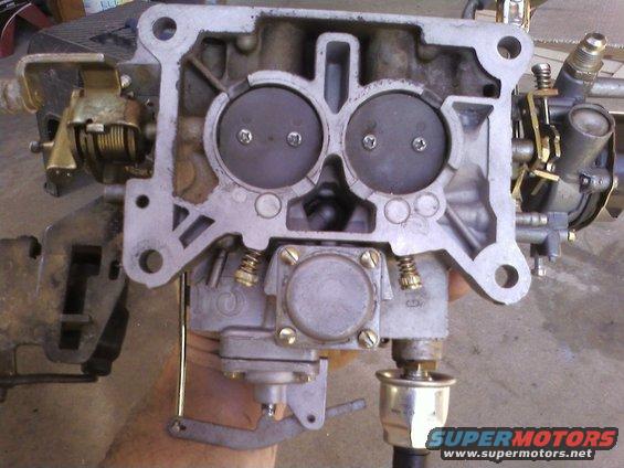 Carburetor with two throttle plates visible