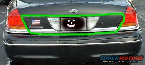 1998 Ford Crown Victoria rear with American flag badge and smiley face license plate