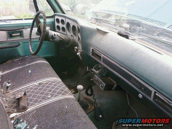 1979 Chevrolet Cheyenne interior showing dashboard, steering wheel, and bench seat