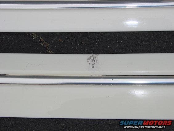 Another scrape on the same molding strip