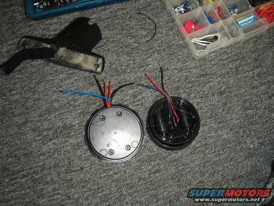 p3130009.jpg i got another mirror motor from the junk yard,
i replaced all the wiring with 18 guage wiring, (unfortunately i didnt have blue 18 guage wire so i put a blue zip tie around it, to identify it)