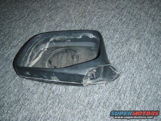 p3060001.jpg close up of broken mirror housing.