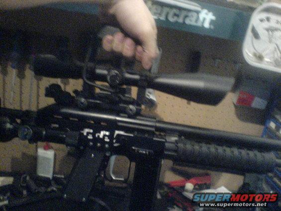 Rifle scope mounted on a firearm